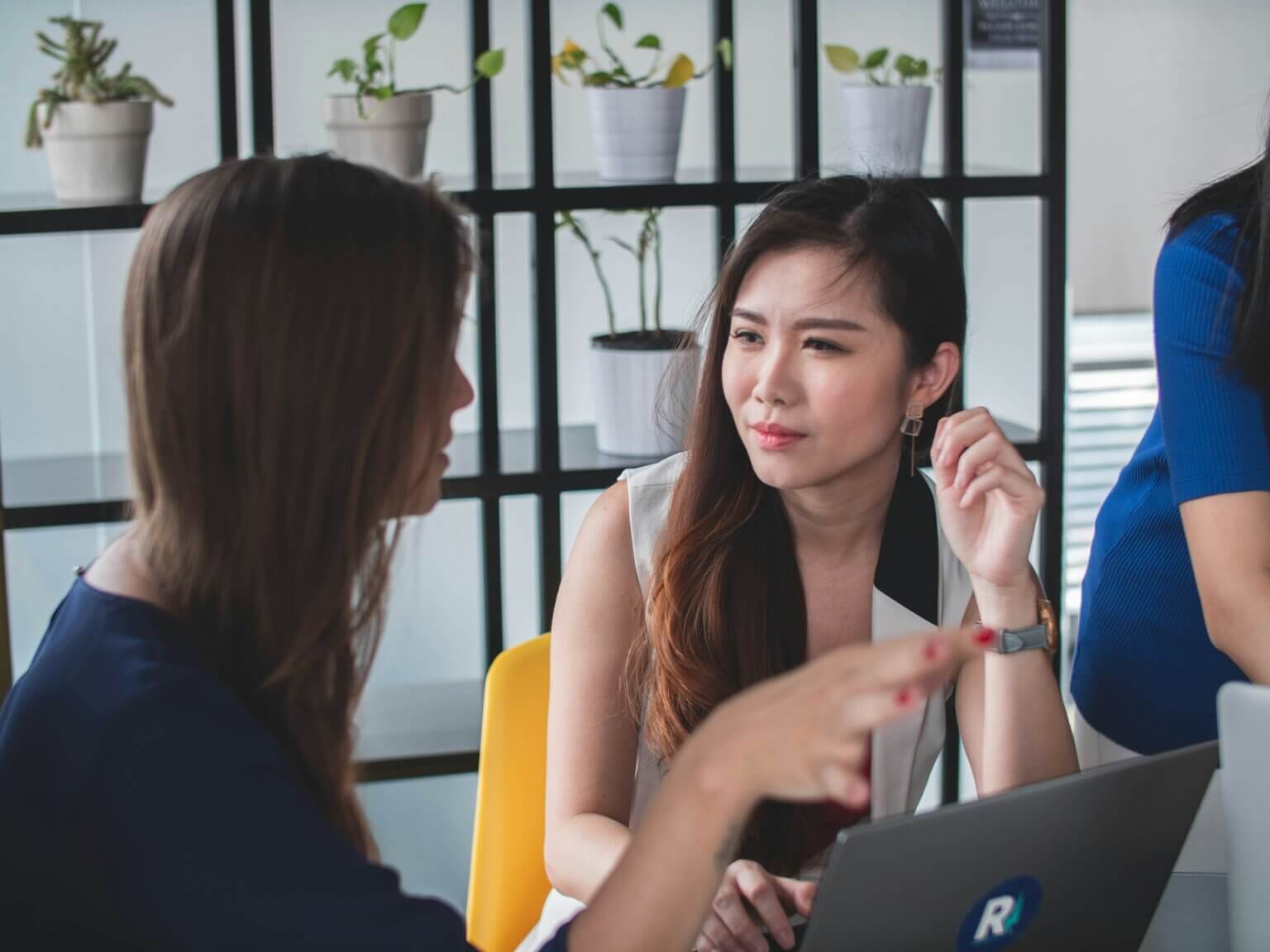 Misunderstanding at work confused woman