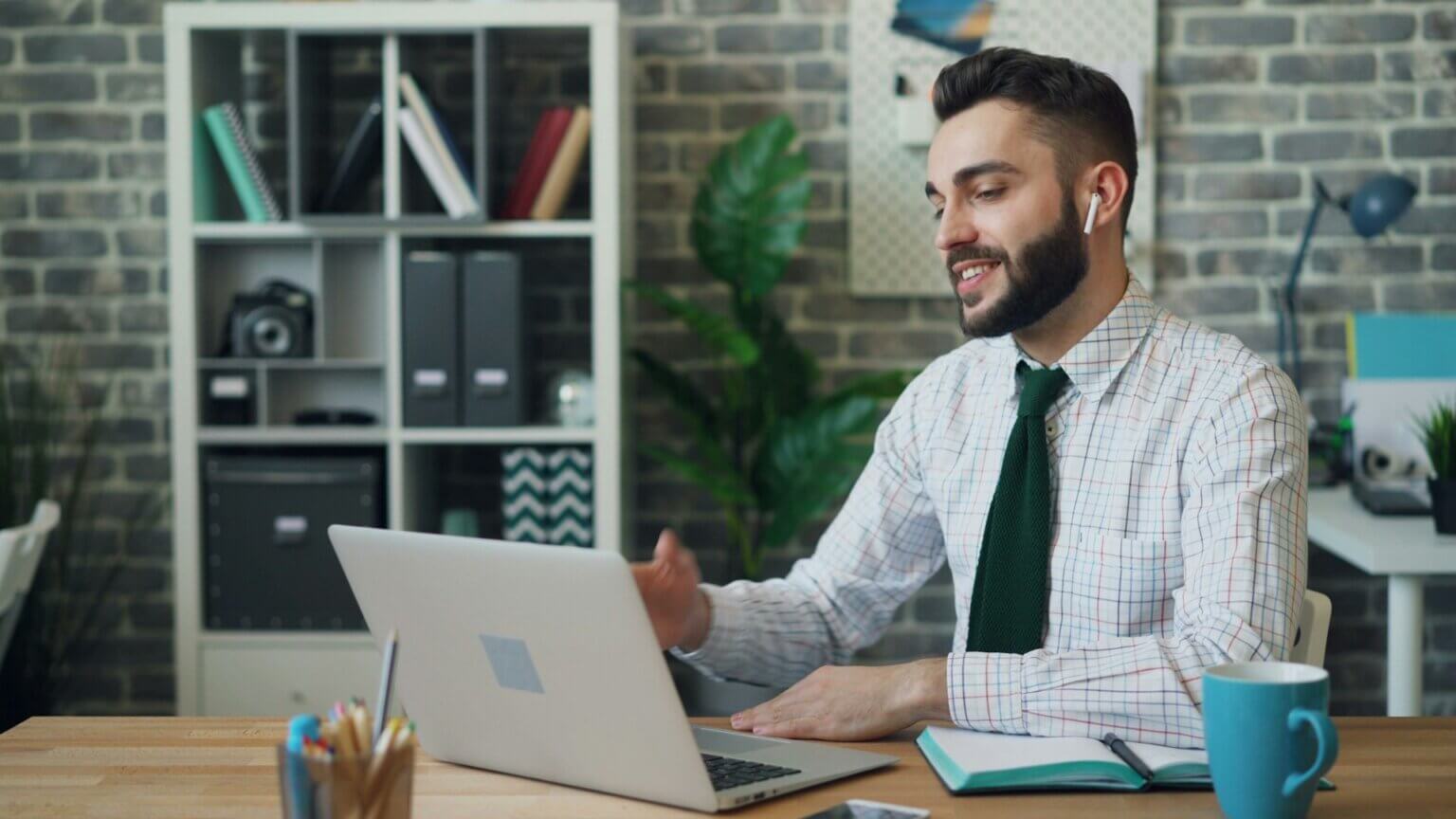 man behind laptop